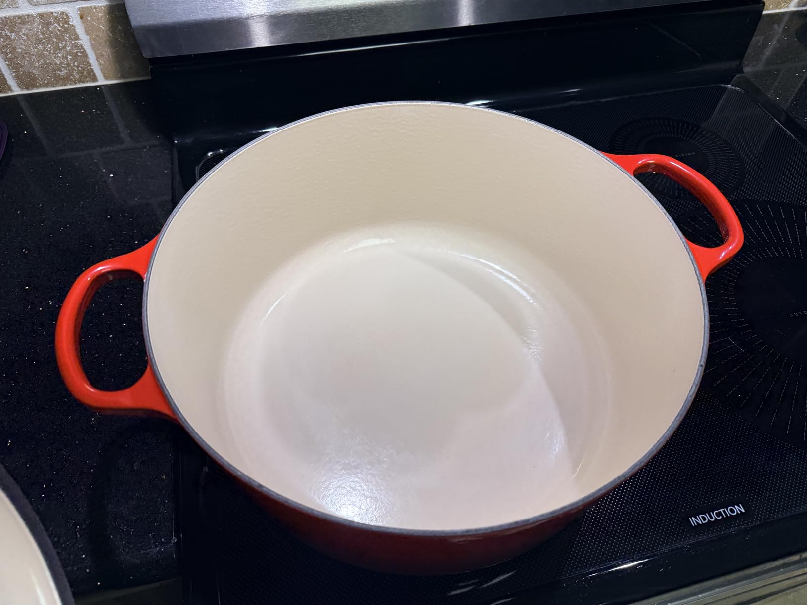 Le Creuset Enameled Cast Iron Round Dutch Oven, 5.5 qt., Flame customer photo 1