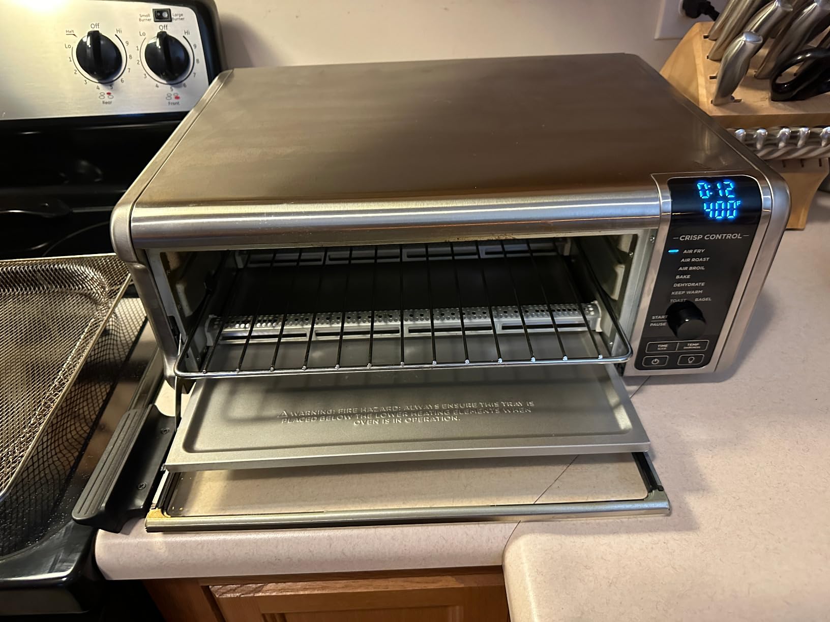 Ninja Digital Air Fryer & Toaster Oven | 8-in-1 Functionality | Flip-Up Design | XL Capacity | Air Fry Basket, Sheet Pan, Wire Rack & Crumb Tray | 1800 Watt | Silver | SP101 customer photo 1