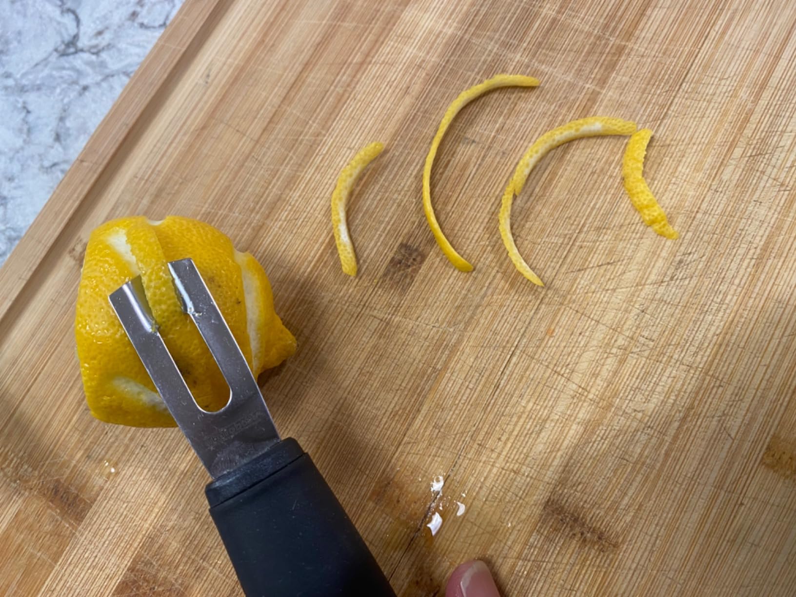 A Bar Above Black Handle Stainless Steel Channel Knife, Chef-Grade Citrus Garnish Tool, Zester and Fruit Peeler for Cocktails, Culinary Presentation, and Kitchen Use customer photo 2
