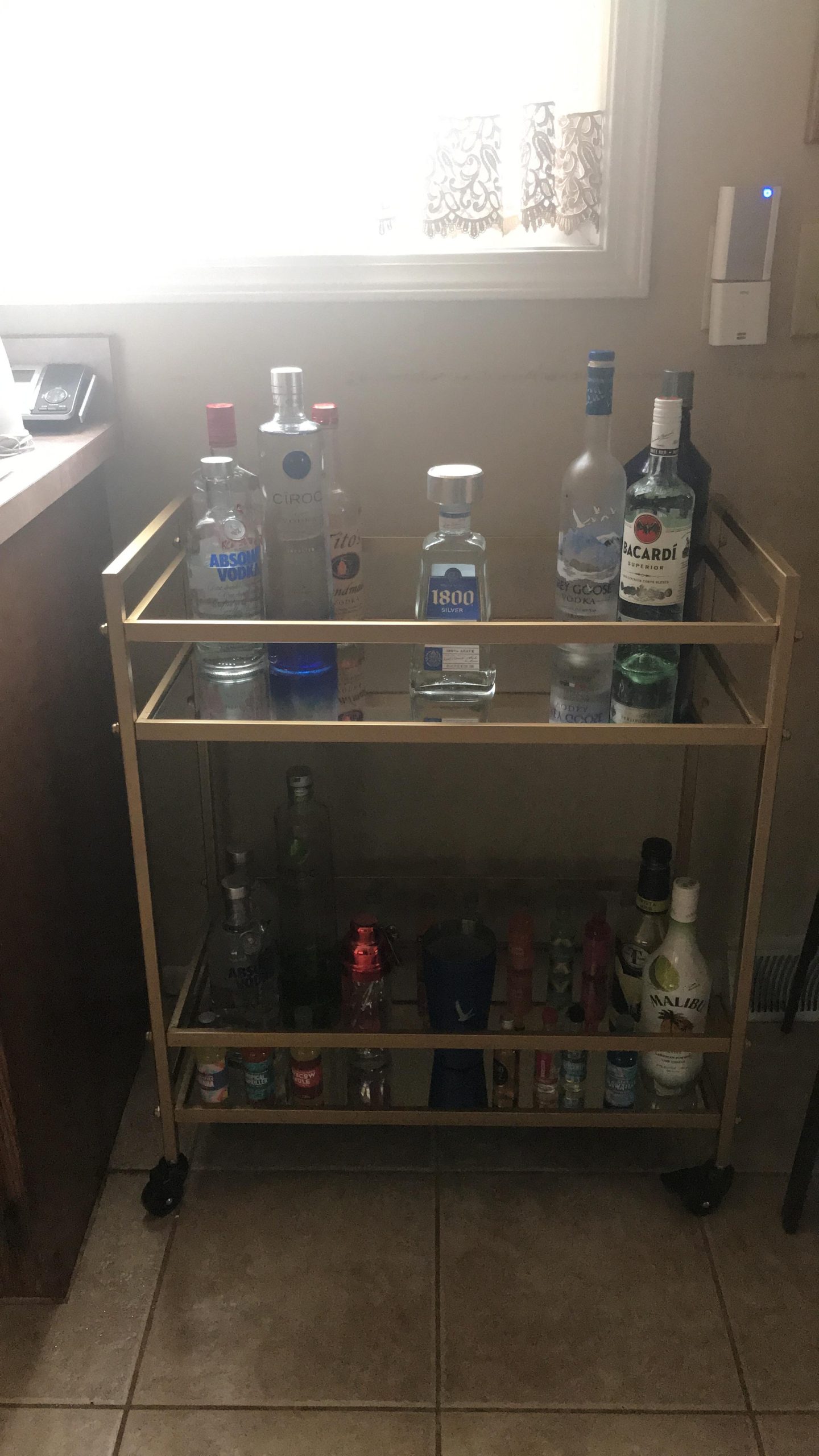 Signature Design by Ashley Plattfield Contemporary Bar Cart with Glass and Marble Shelves and Locking Casters, Antique Gold and White customer photo 2