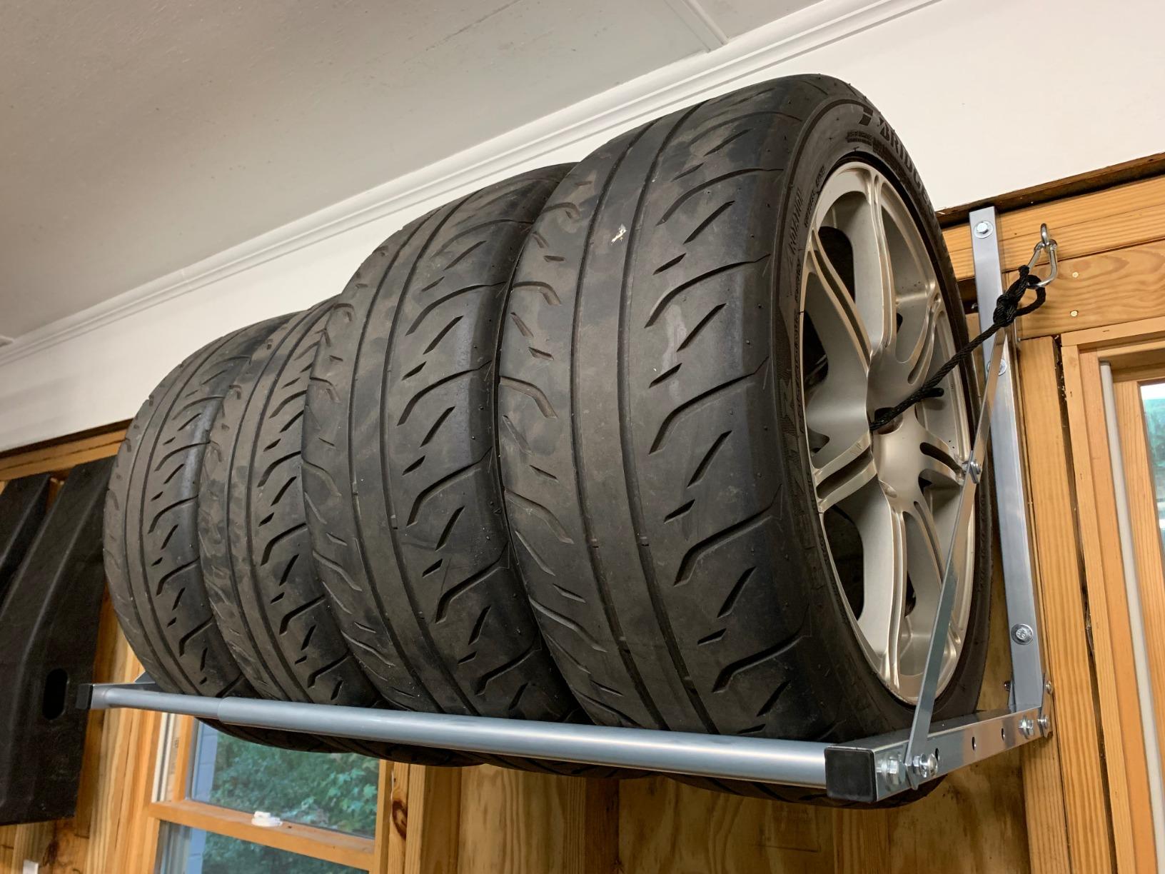 HyLoft Model 01012 Tire-Loft Multi Tire Storage System Rack, Adjustable Width of 36 Inches to 48 Inches, Holds Up To 375 Pounds, Red customer photo 1