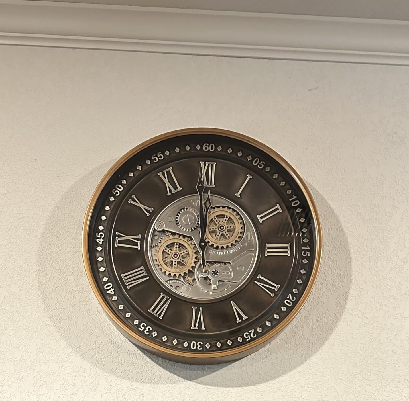 CLXEAST 24 Inch Large Moving Gear Wall Clock for Living Room Decor, Bronze | Durable Metal Case, Silent Non Ticking, Oversized Industrial Roman Numeral Wall Clocks for Dining Room & Home Office customer photo 1