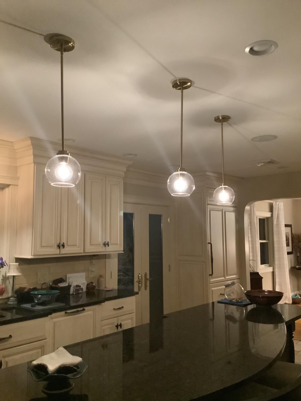 Black Globe Pendant Light, 6 Inch Modern Clear Glass Hanging Fixture | Matte black finish, pendant light for kitchen islands with adjustable height, compatible with flat or sloped ceilings. customer photo 1