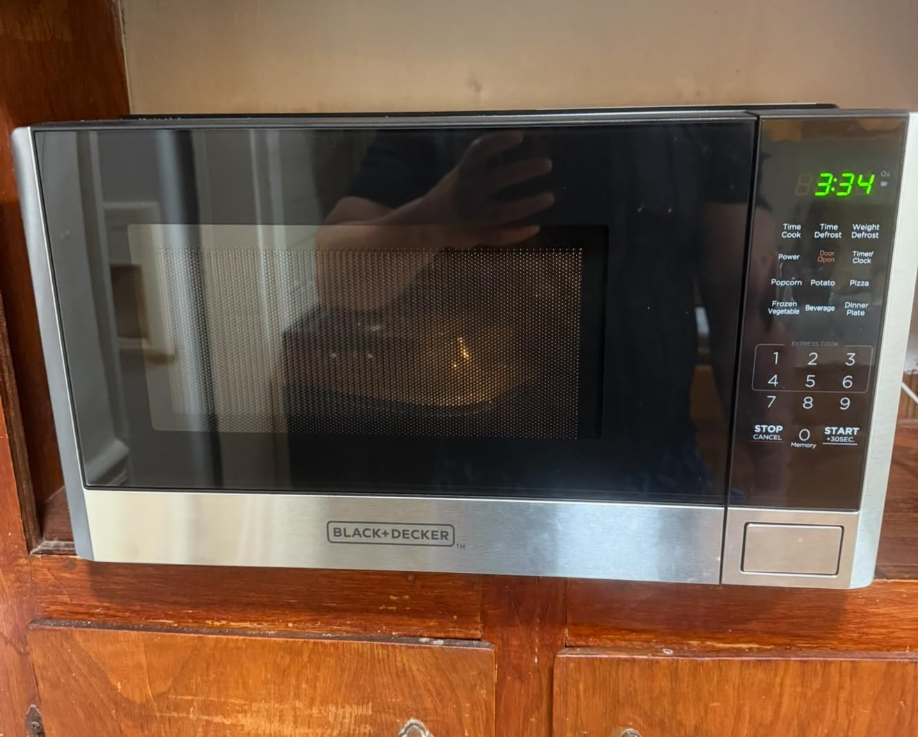 BLACK+DECKER Over the Range Microwave Oven, 1.7 Cu.Ft, 1000W | Stainless Steel, Over Stove Install, Vent Fan with Light, One-Touch Auto Cooking, 10 Power Levels, Child Safety Lock customer photo 1