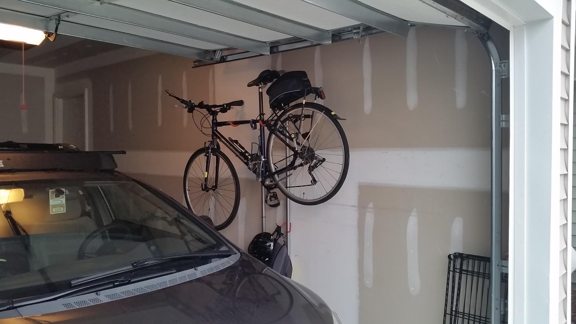 Delta Wall Ride Bike Rack Wall Mount with Tire Wall Guard Cycle - Vertical Bike Mount Holds Up to 100 lbs - Fully Adjustable Vertical Hanger Hook Design Provides Easy Bicycle Storage Access customer photo 2
