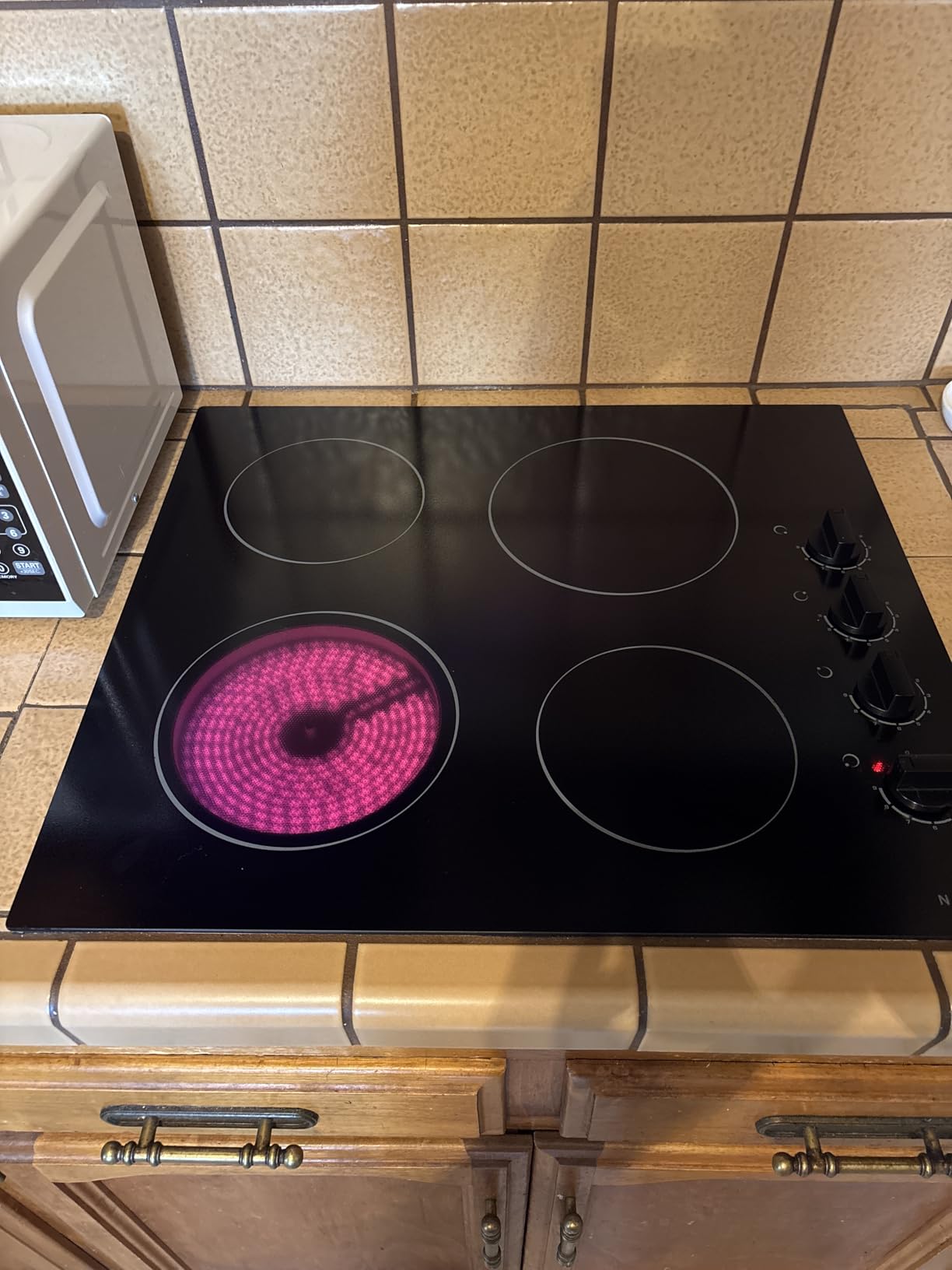 Noxton 30 Inch Electric Cooktop, Glass Protection Metal Frame, Knob Control, Built-in Radiant Stove Top, Dual Ring Expandable Burner customer photo 1
