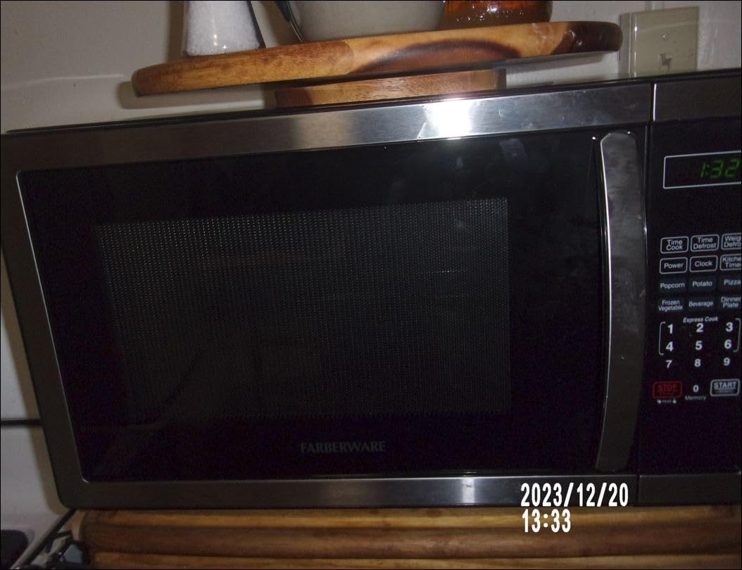 Farberware 1.1 Cu. Ft. Countertop Microwave Oven - 1000 Watts Power, Auto Cook Settings, Defrost, Easy Clean and Child Safety Lock - Stainless customer photo 2