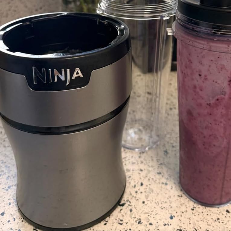 Ninja Nutri-Plus Personal Blender, 900PW, (3) 20oz Cups, Silver, BN301 | 900-peak-watt push-to-blend motor for smoothies & sauces. (3) 20-oz cups, 2 spout lids & storage lid. Dishwasher safe. customer photo 1