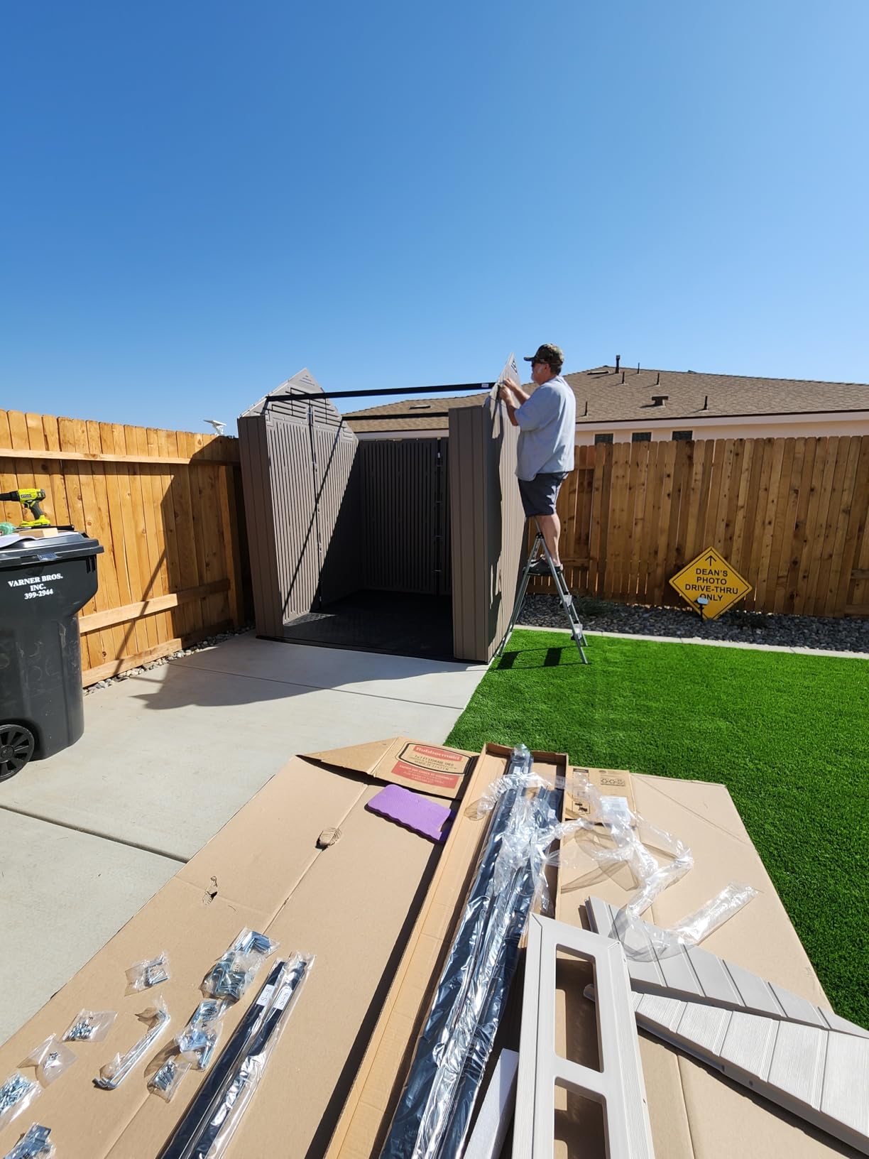 Rubbermaid Large Resin Outdoor Storage Shed With Floor (7 x 7 Ft.), Weather Resistant, Brown, Organization for Home/Lawn Mower/Backyard Equipment/Bike Storage/Pool Supplies customer photo 1