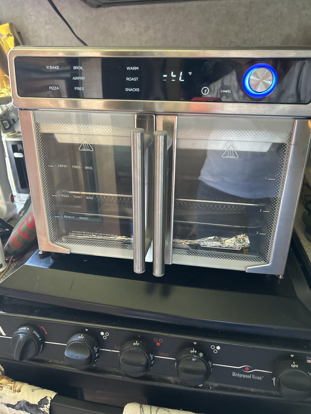 BLACK+DECKER 12-in-1 Crisp 'N Bake Air Fryer Toaster Oven | 12-in-1 air fryer toaster oven fits a 12-inch pizza with convection cooking for crispy, fast family meals. customer photo 2