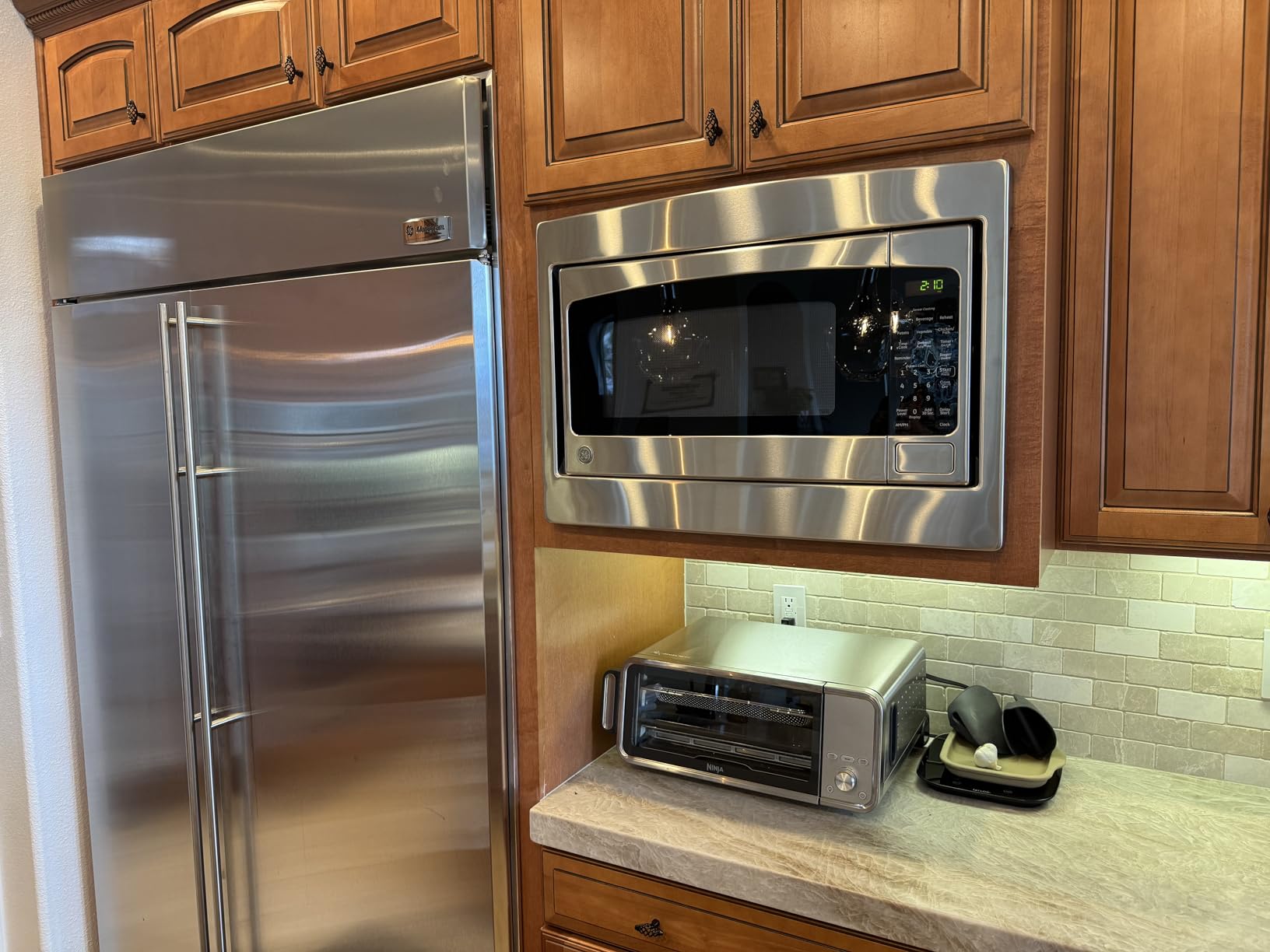 GE Countertop Microwave Oven, 1,200-watt Capacity, 2.0 Cubic Ft., 8 Auto Setting Cooking Settings, Child-Lock Technology, Kitchen Essentials for the Countertop, Dorm Room or Apartment, Stainless Steel customer photo 1