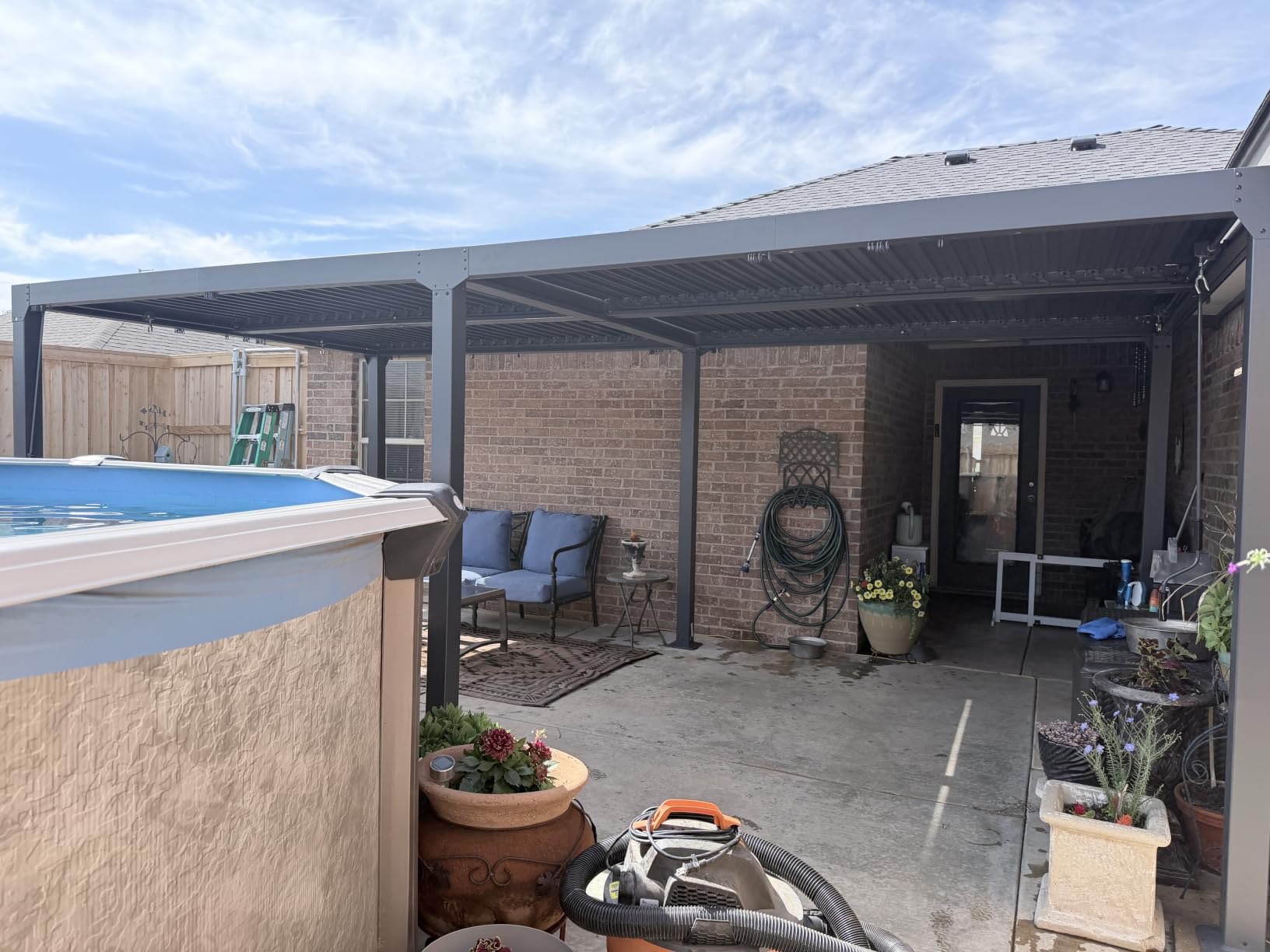 EROMMY Louvered Pergola 10x12, Outdoor Aluminum Pergola with Adjustable Rainproof Roof for Garden, Patio, Deck, Waterproof Curtains and Netting Included, Gray-Black customer photo 1